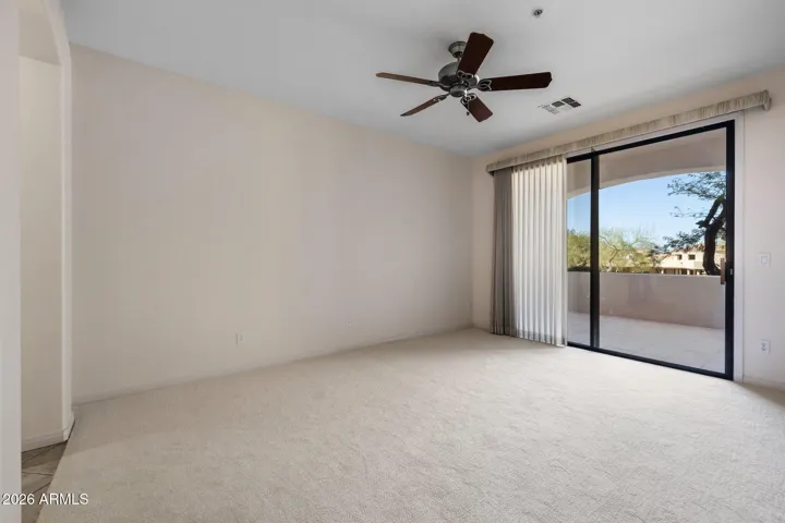 Spacious master with delightful tiled patio