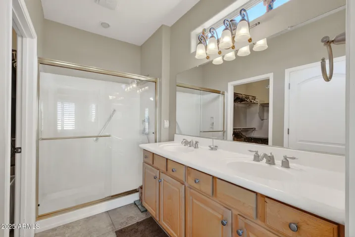 Dual sinks and walk-in shower