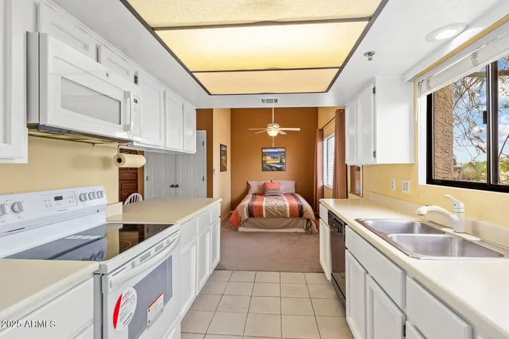 OWNER IS USING THIS EXTRA DINING AREA AS A 2ND BEDROOM AREA