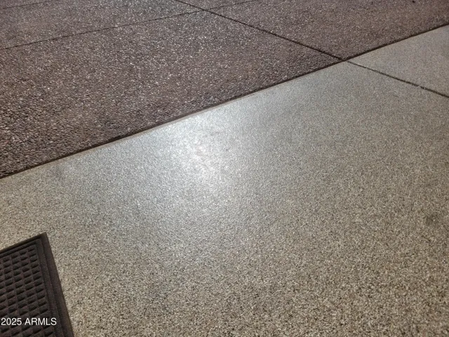 The 2 car garage has a professionally-applied epoxy floor