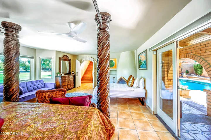 Breathtaking view in Master Bedroom with Ritz Carlton Golf green on the left and an enclosed, extremely private heated Roman pool with outdoor shower on right for skinny dipping.