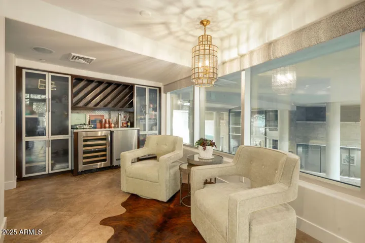 Sitting Area off the Kitchen with Built in Bar