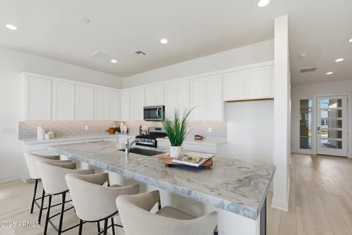Upgraded Honed Quartz Countertops at the Large Island