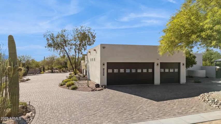 Garage view and paver driveway
