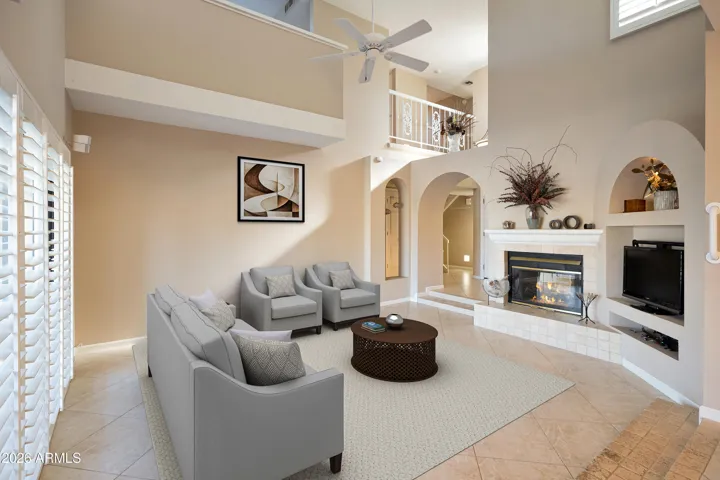 Sunken Living Room with 2 Way Firplace and Entertainment Niche