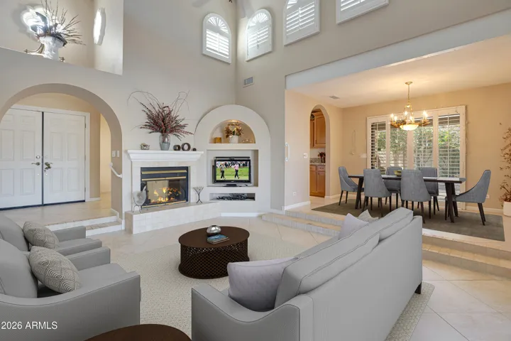 Sunken Living Room with 2 Way Firplace and Entertainment Niche