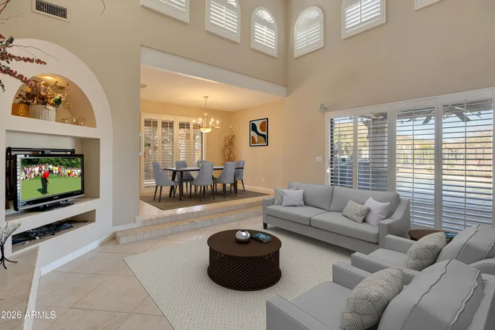 Sunken Living Room with 2 Way Firplace and Entertainment Niche