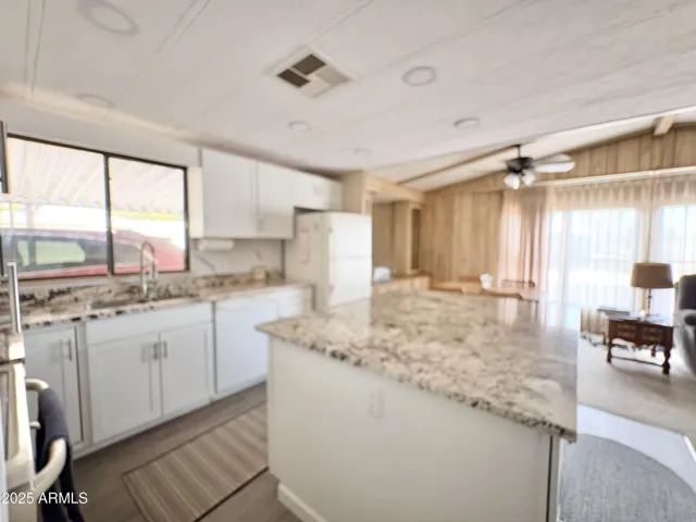 VIEW OF KITCHEN TO DINING AREA