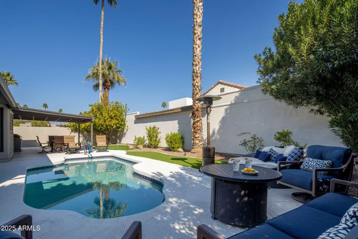 Gorgeous pool! Surrounded by several seating areas.