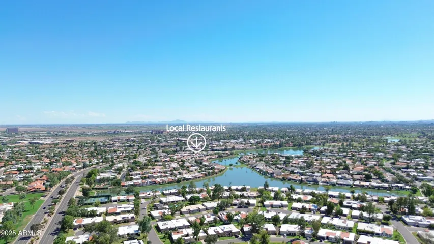 Southern aerial view towards lakes and restaurants