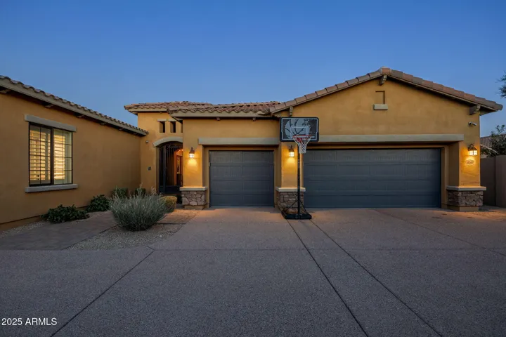 Fully insulated 3-car garage with insulated doors, climate control, and EV charging.