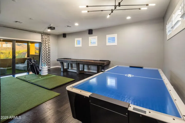 Bonus 2nd floor game room with Dolby Atmos, designer lighting, and an expansive covered balcony with the best views!