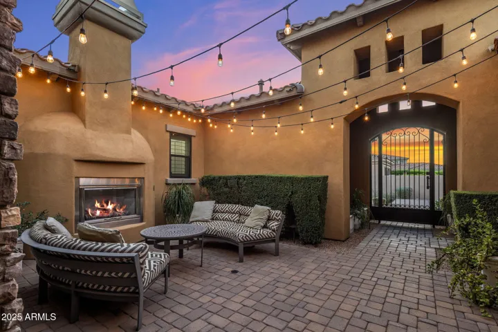 Charming front couryard with gas fireplace