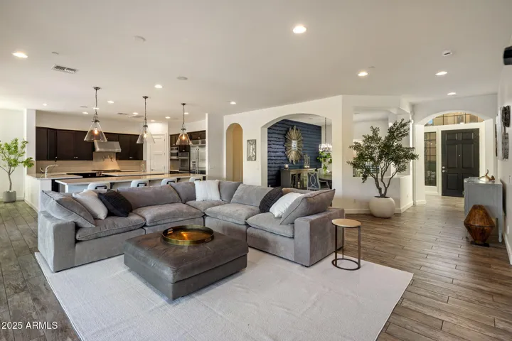 Great room with gas fireplace, built ins, and 20 ft slider