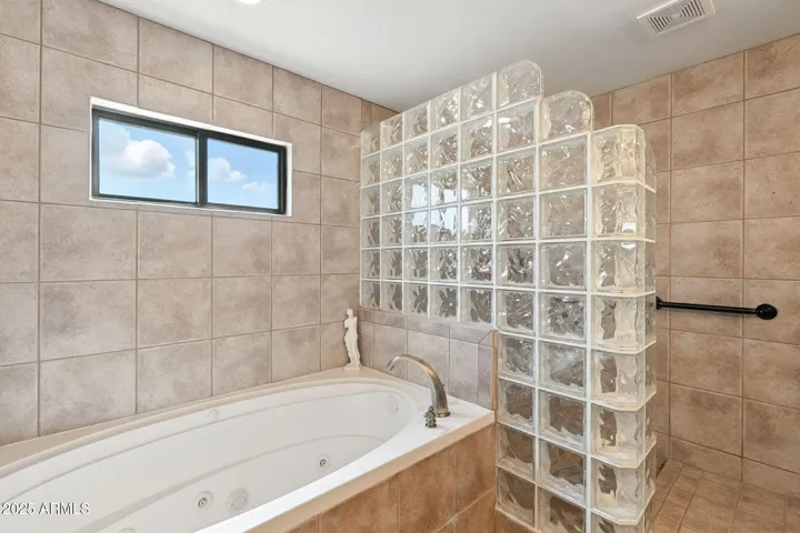 bathtub in primary bedrom