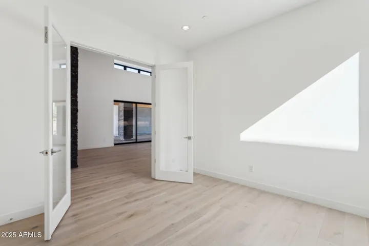 Office with courtyard view and double glass doors