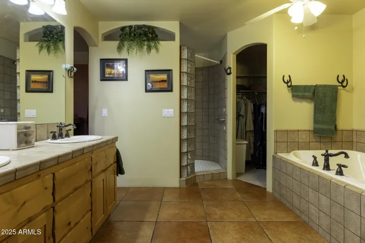 Main Bedroom Ensuite with Tiled Shower, Jetted Tub and Two Walk in Closets