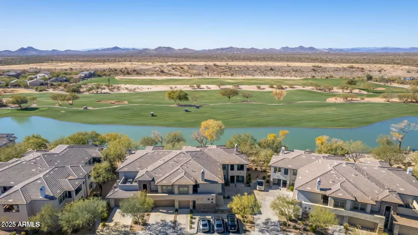 BEST LOCATION IN COMMUNITY ON THE 18th HOLE OVERLOOKING THE WATER