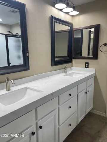 PRIMARY BATH WITH DOUBLE SINKS & QUARTZ COUNTERS