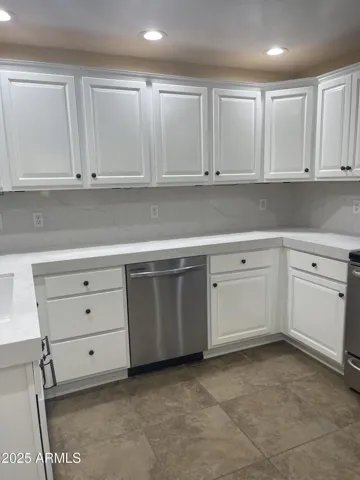 LOTS OF COUNTER SPACE WITH STAINLESS STEEL APPLIANCES