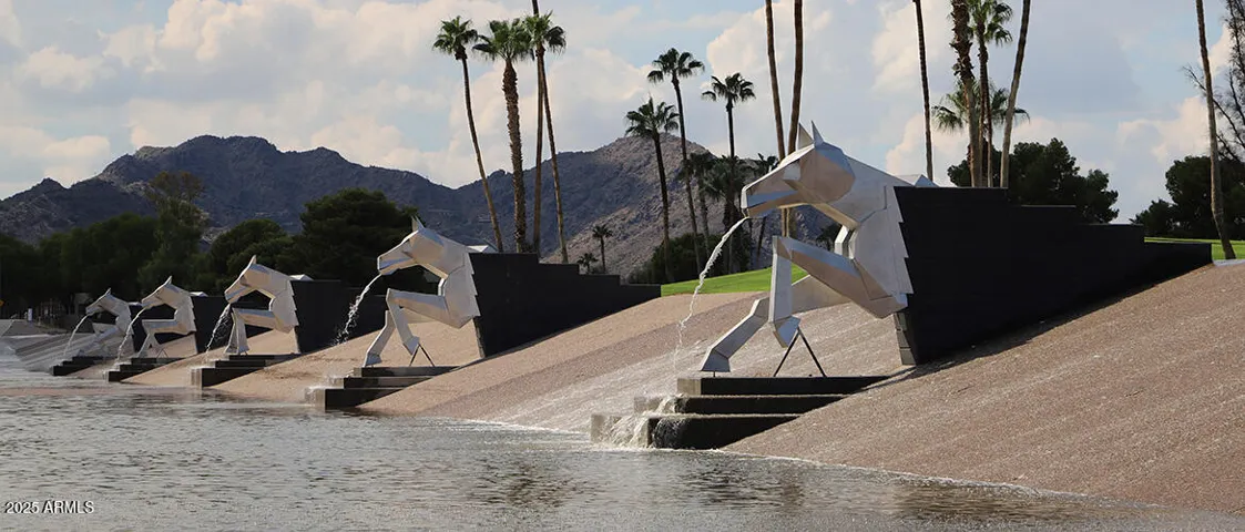 Equine gargoyles spouting water