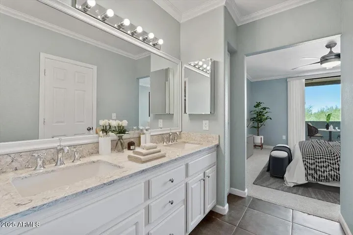 Ensuite Primary Bedroom with updated bathroom tops