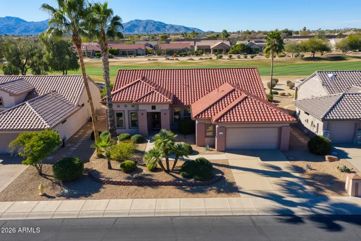 Aerial view highlighting this golf course home’s prime location on the Granite Falls South fairway. The open layout and breathtaking mountain backdrop define upscale Arizona living.