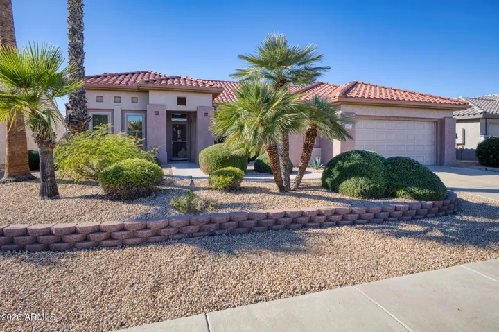 Aerial shot highlights the home’s placement directly on the golf course with dramatic Arizona sunset views. Ideal for buyers seeking peace, beauty, and luxury in every detail.