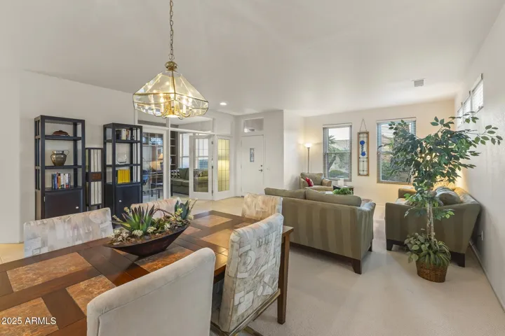 Cozy living area with plush seating, modern décor, and abundant natural light—an inviting retreat for family and friends.