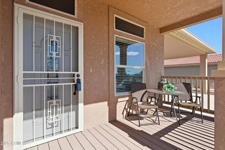 Inviting front porch with low-maintenance landscaping and an ideal spot to enjoy morning coffee or evening sunsets.