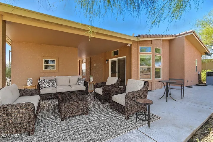 Behind the rear covered patio is the large under roof storage shed.