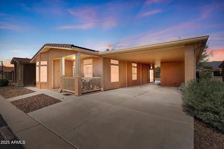 Very well maintained manufactured home on one of the few lots with views at the front and rear and includes an extended depth 2 car carport perfectly accomodates 2 vehicles and a golf cart.