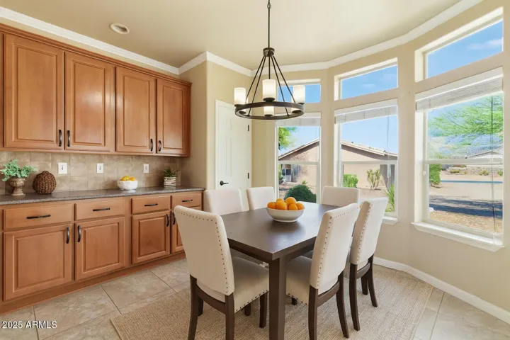 Ample room for comfortable seating with easy access to the patio through sliding glass doors for seamless indoor-outdoor living.