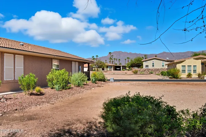 Enjoy the Superstition Mountain views from the rear covered and extended patio!