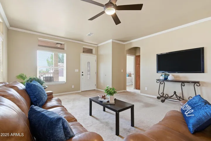 Neutral tones and open sightlines highlight the home’s modern appeal and functional layout.