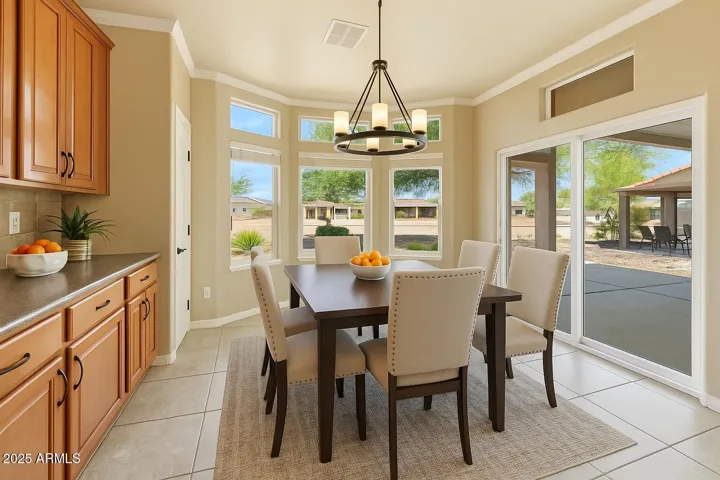 You can enjoy your breakfast, lunch and dinner while viewing the Superstition Mountains through numerouse bay windows, which includes blinds. Also includes an easy sliding glass door with interior blinds between the glass panes