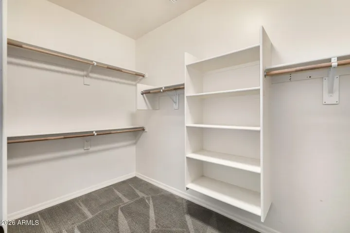 Walk-In Closet in Primary Bedroom