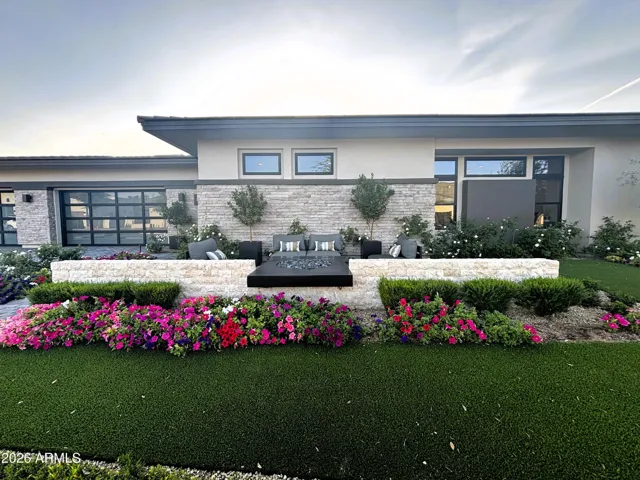 Front of home sitting area with floating firepit is a perfect spot to watch the sunrise or Toast to another Amazing Day at Merion Grove!
