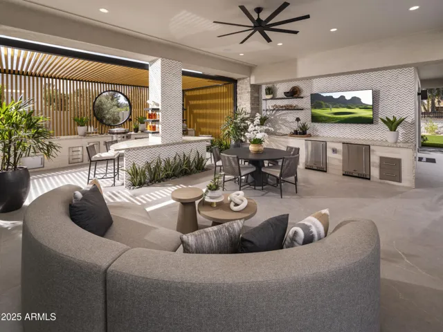 Expansive covered outdoor kitchen and living area.