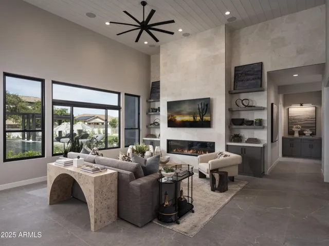 Great room with pool views and designer finishes that stay with the home!