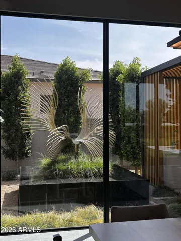Upgraded Window off the dining to display this stunning Sculpture and Fountain Feature.!!