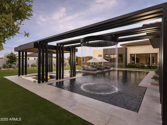 Entertainer's Dream Backyard Resort on 1/2 Acre Lot, Infinity Edge Pool, Sunken sitting area w/ firepit Stunning Steelwork Pergola and one-of-a kind waterfall feature!