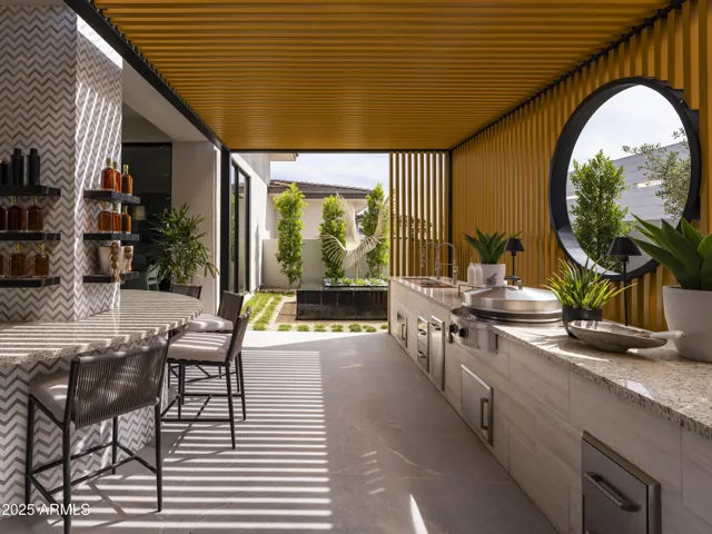 Outside grill and bar area perfect for any occasion right off the pool!