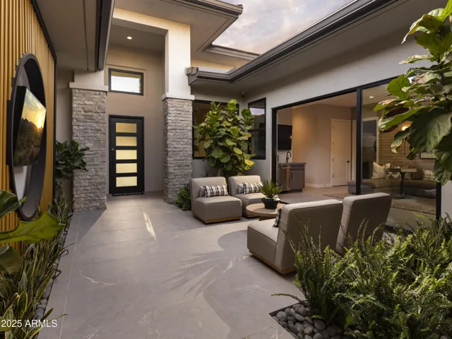 Welcoming Enclosed Front Courtyard provides another unique space to the home. Large flex space to the right w/ stacking slider brings the outside in!