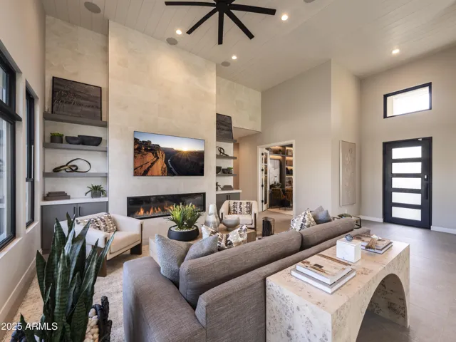 Tiled linear fireplace at Great room