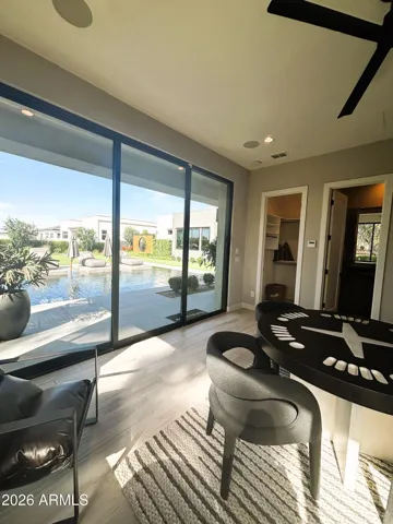 Covered Entry to Casita is off the pool area , but split from the main home behind the outdoor kitchen and living space. Upgraded walk in closet & full bath along with 2 beverage fridges is perfect for entertaining or an extended stay!