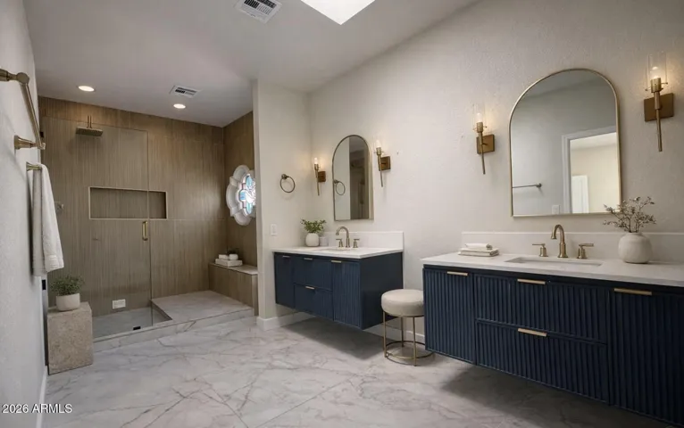 Resort Style Primary Bathroom with Full Sized Walk In Shower, Nook and Double His/Hers Vanities.