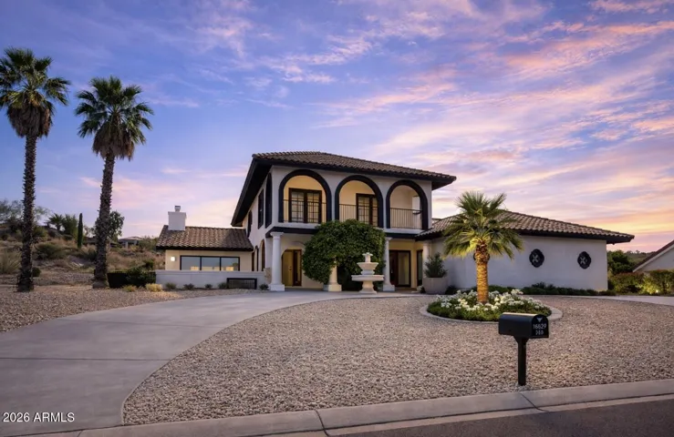 Impressive Curb Appeal, from Venetian Arches to the Circular Driveway... This is quiet luxury. * virtually staged/AI Enhanced,