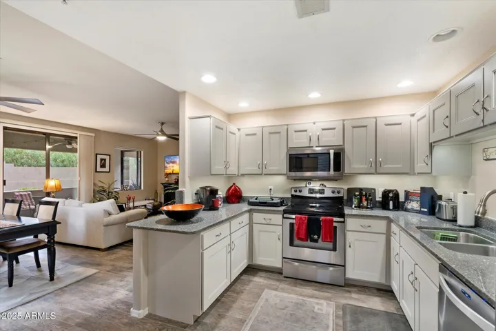 Kitchen open to Dining and Living room