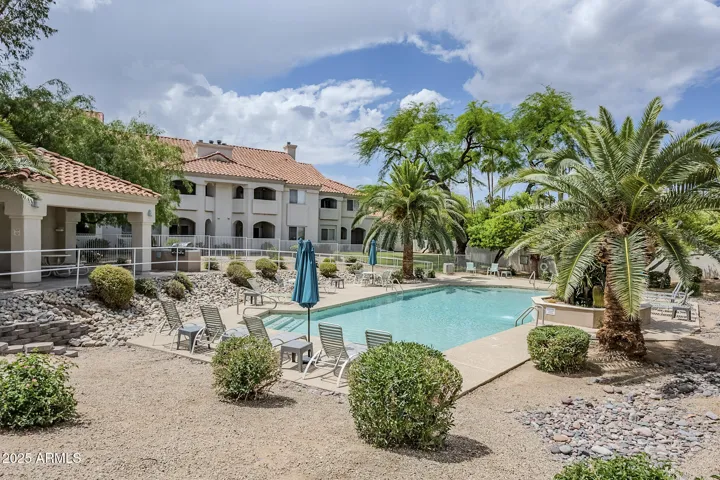 Resort-like community pool, ramada and BBQ grill